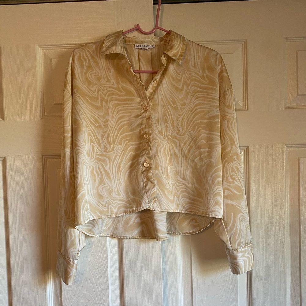 And now this size small cream marble long sleeve cropped button up